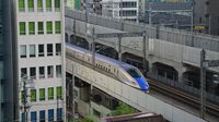 E7 Shinkansen passes Hotel