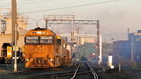 NR68 on freighter departing Dynon