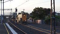 NR pulling empties past Middle Footscray