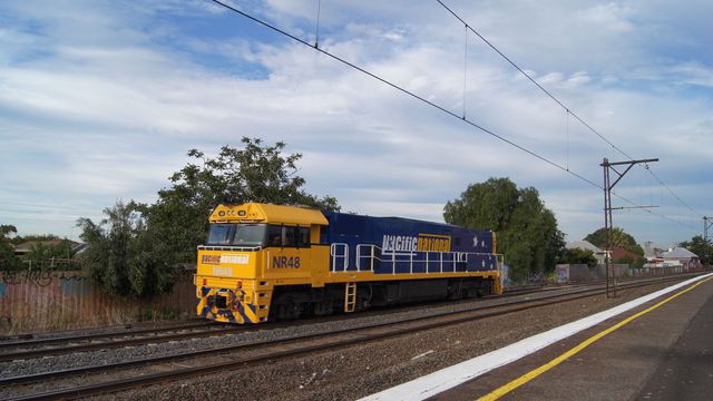 NR48 light engine past Middle Footscray